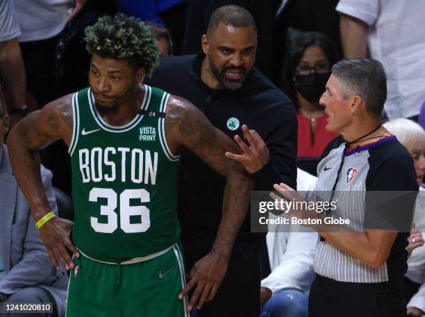 Boston Celtics head coach Ime Udoka reacts to referee Scott Foster against the Miami Heat during the second quarter. The Boston Celtics visit the...