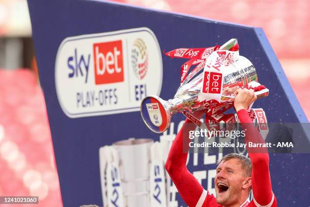 Joe Worrall of Nottingham Forest lifts the trophy during the Sky Bet Championship Play-Off Final match between Huddersfield Town and Nottingham...
