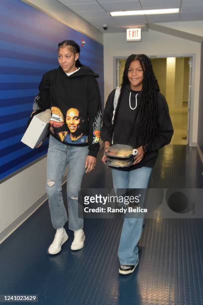 Candace Parker of the Chicago Sky and her daughter, Lailaa Nicole Williams, arrive at the arena before the game against the Phoenix Mercury on May...