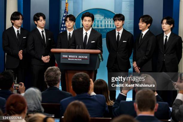 Members of the South Korean pop group BTS or Bantam Boys, V , JK , Jimin , RM Rap Monster , Jin , J-Hope and Suga speak at the daily press briefing...