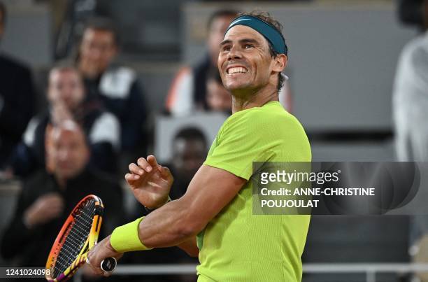 Spain's Rafael Nadal reacts after winning against Serbia's Novak Djokovic at the end of their men's singles match on day ten of the Roland-Garros...