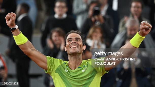 Spain's Rafael Nadal reacts after winning against Serbia's Novak Djokovic at the end of their men's singles match on day ten of the Roland-Garros...