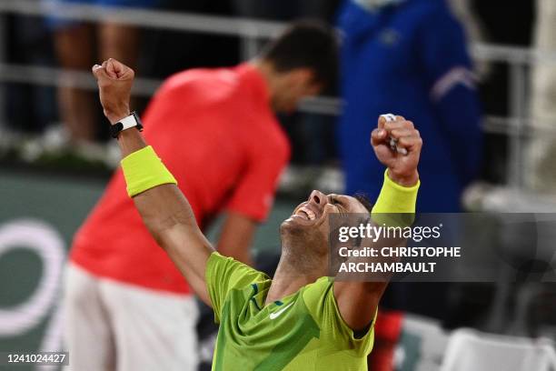 Spain's Rafael Nadal reacts after winning against Serbia's Novak Djokovic at the end of their men's singles match on day ten of the Roland-Garros...