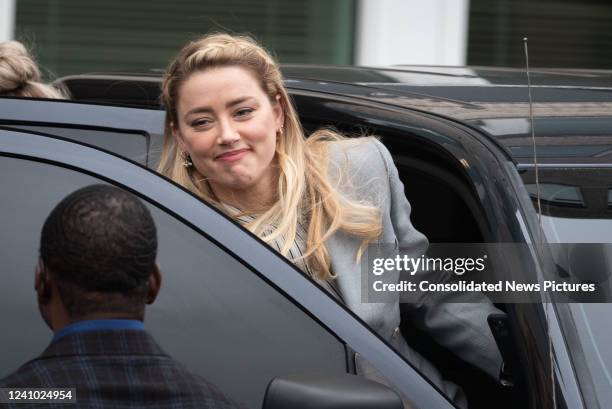 Amber Heard departs outside court during the Johnny Depp and Amber Heard civil trial at Fairfax County Circuit Court on May 27, 2022 in Fairfax,...