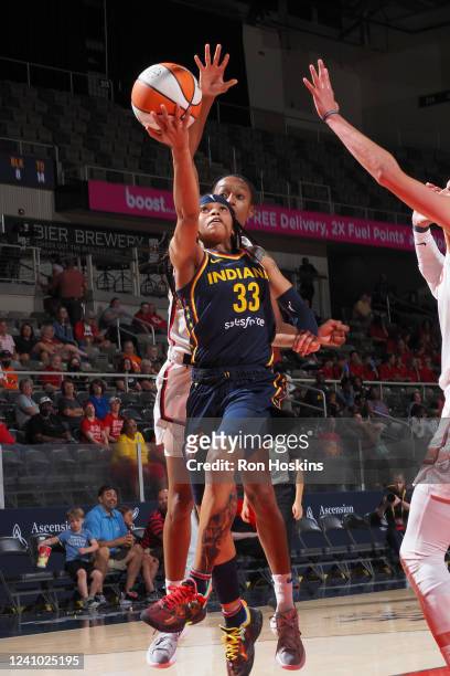 Destanni Henderson of the Indiana Fever drives to the basket during the game against the Washington Mystics on May 31, 2022 at Gainbridge Fieldhouse...