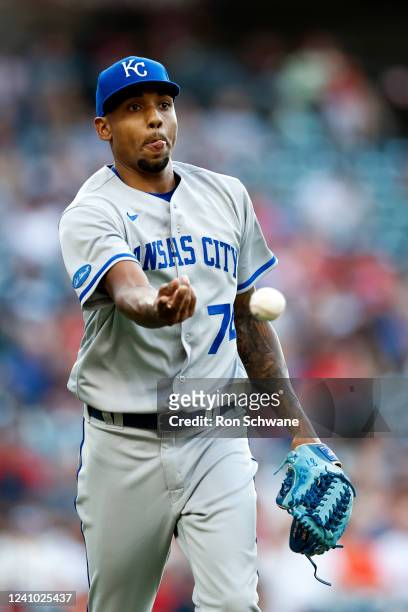 Jose Cuas of the Kansas City Royals throws out Myles Straw of the Cleveland Guardians at first base during the fifth inning at Progressive Field on...