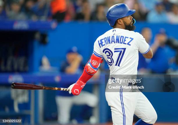 Teoscar Hernandez of the Toronto Blue Jays hits a two RBI double agains the Chicago White Sox in the fifth inning during their MLB game at the Rogers...