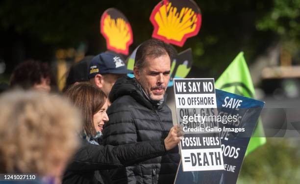 Climate activists at the protest action against seismic blasting on the West Coast outside Southern Sun hotel on May 28, 2022 in Cape Town, South...