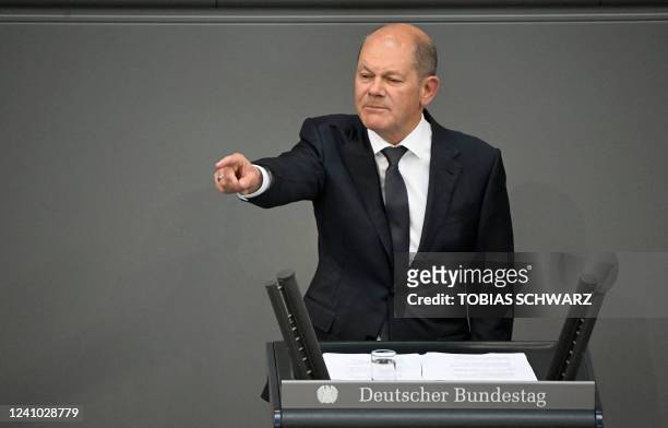 German Chancellor Olaf Scholz addresses parliament on a budget debate during a session at the Bundestag in Berlin on June 1, 2022.