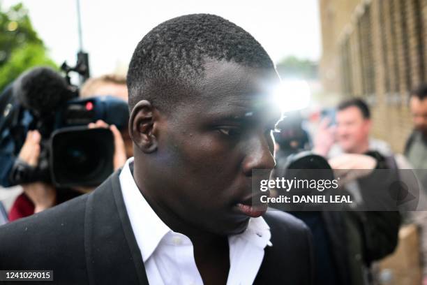 West Ham's French defender Kurt Zouma arrives at the Thames Magistrates' Court, in London, on June 1, 2022 to attend his sentencing for kicking and...