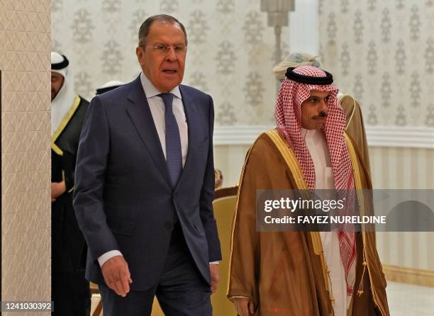 Russian Foreign Minister Sergei Lavrov and his Saudi counterpart Prince Faisal bin Farhan, arrive to attend the Gulf Cooperation Council meeting, in...