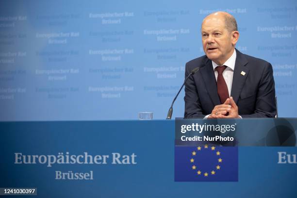 Olaf Scholz Federal Chancellor of Germany talks at a press conference to the media after the end of the 2-day extraordinary special EU summit about...