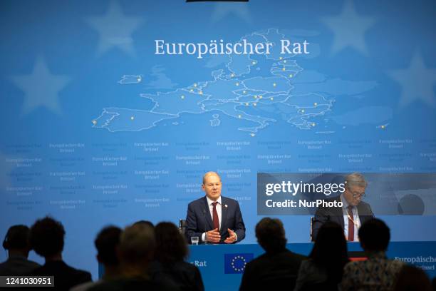 Olaf Scholz Federal Chancellor of Germany talks at a press conference to the media after the end of the 2-day extraordinary special EU summit about...