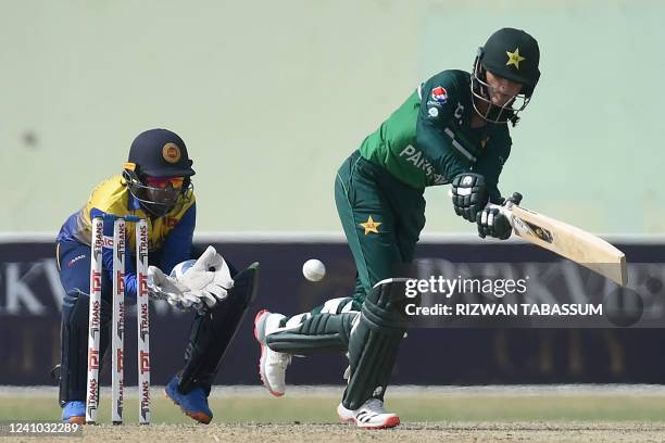 Pakistan's captain Bismah Maroof plays a shot during the first one day international womens cricket match between Pakistan and Sri Lanka at the...