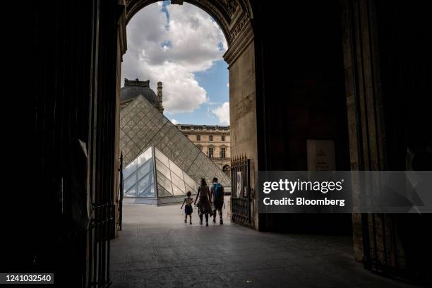 Tourists visit the Louvre Museum in Paris, France, on Tuesday, May 31, 2022. Paris tourism is bouncing back to take in the sights that make the...