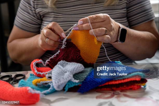 Julie Bartram crochets bunting at the Beccles Community Hub on June 1, 2022 in Beccles, England. The people of Beccles, Suffolk hope to break the...