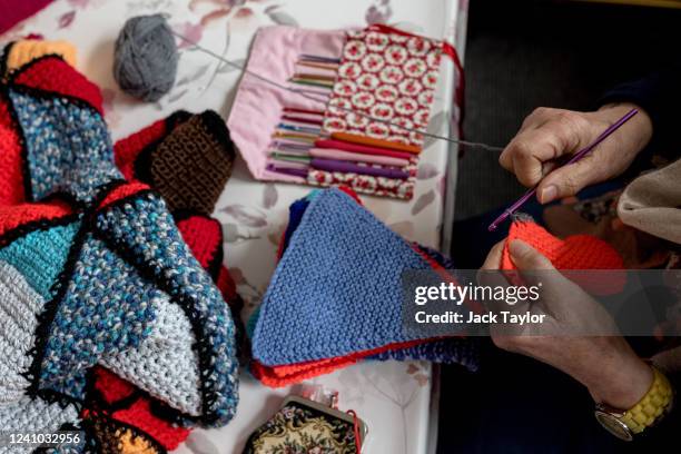 Diane Hunt crochets bunting at the Beccles Community Hub on June 1, 2022 in Beccles, England. The people of Beccles, Suffolk hope to break the world...