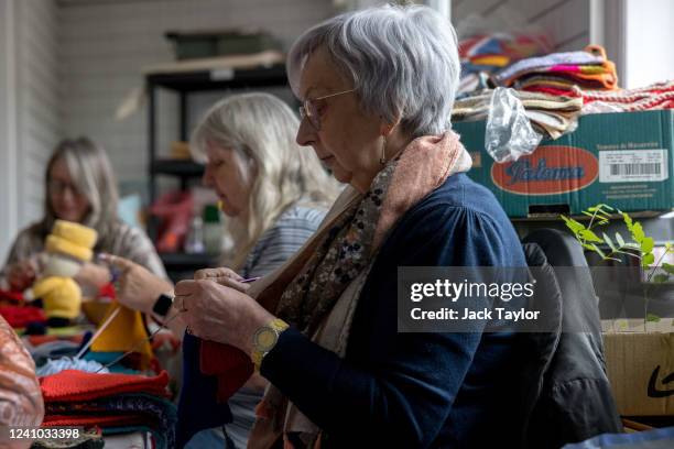 Diane Hunt crochets bunting at the Beccles Community Hub on June 1, 2022 in Beccles, England. The people of Beccles, Suffolk hope to break the world...