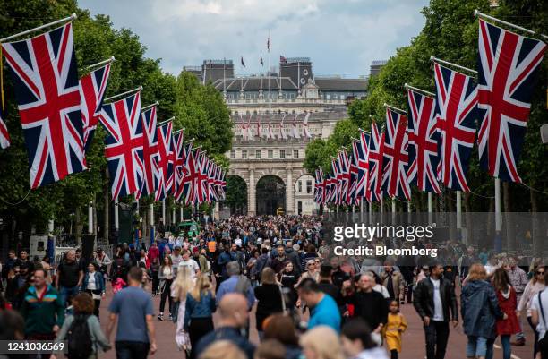 Visitors walk along the Mall near Admiralty Arch ahead of the Queen's Platinum Jubilee celebrations in central London, UK, on Wednesday, June 1,...