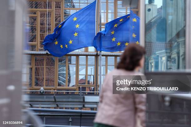 European Union flags fly outside the European Commission building in Brussel on June 1, 2022.