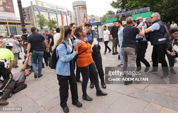 Police detain protesters during a gathering in memory of Ethem Sarisuluk, a 26-year old Turkish man killed by a riot police officer in June 2013...