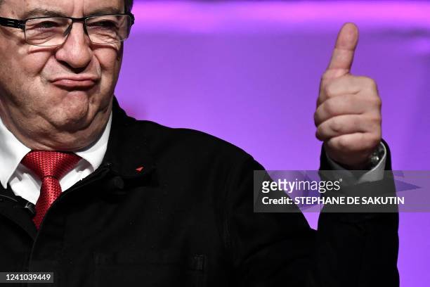 Nupes leader Jean-Luc Melenchon of the LFI leftist party gives a thumbs up as delivers a speech during a political meeting of French left-wing...