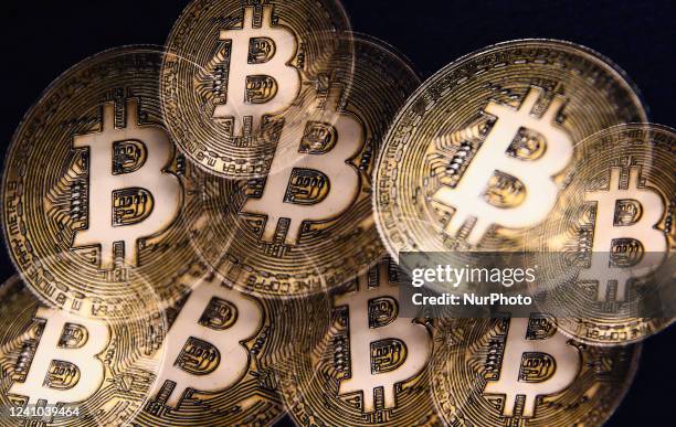 Representation of Bitcoin cryptocurrency and an illustrative chart are seen in this multiple exposure illustration photo taken in Krakow, Poland on...