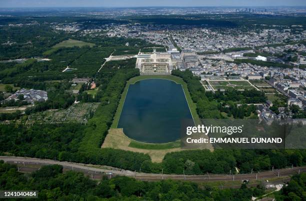 An aerial view taken on June 1, 2022 shows Versailles Castle and its gardens, in Versailles, south-west of Paris.