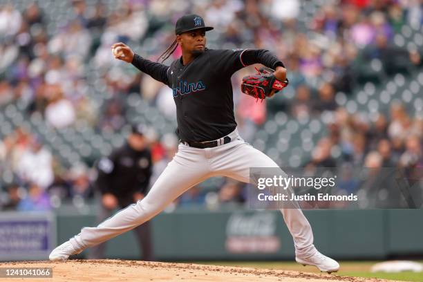 Starting pitcher Edward Cabrera of the Miami Marlins delivers to home plate in the second inning against the Colorado Rockies in game one of a double...