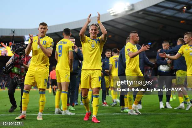 Players of Ukraine celebrate at full time during the FIFA World Cup Qualifier Play-Off Semi-Final match between Scotland and Ukraine at Hampden Park...