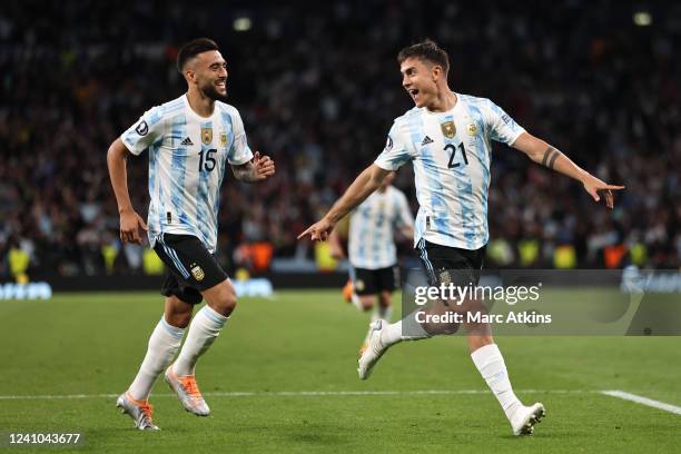 Paulo Dybala of Argentina celebrates scoring his goal with Nicolas Gonzalez during the Finalissima 2022 match between Italy and Argentina at Wembley...