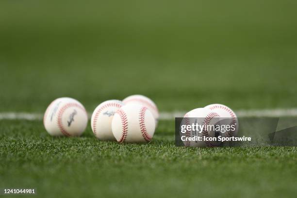 Some baseball on the grass before the MLB game between the Toronto Blue Jays and the Los Angeles Angels of Anaheim on May 27, 2022 at Angel Stadium...