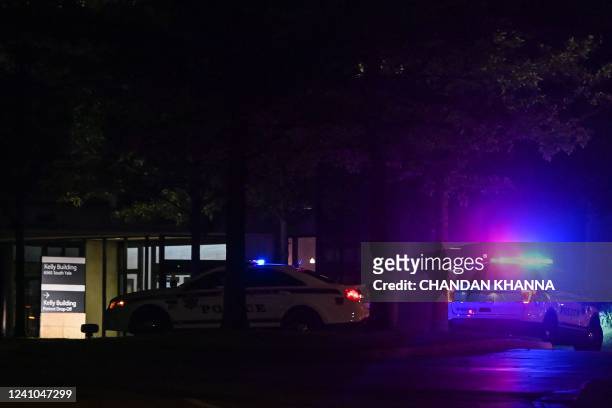 Tulsa police cars block the entrance of the Natalie Medical Building at Saint Francis Hospital campus in Tulsa, Oklahoma, on June 1, 2022. - A gunman...
