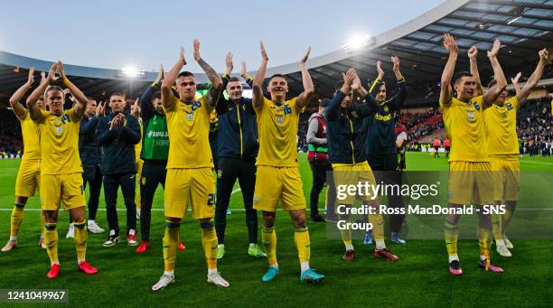 The Ukraine players applaud their fans at full time during a FIFA World Cup Play-Off Semi Final between Scotland and Ukraine at Hampden Park, on June...