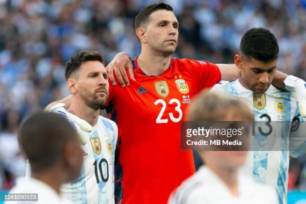 Lionel Messi, Emiliano Martinez and Cristian Romero of Argentina line up for the national anthem before the Italy v Argentina - Finalissima 2022...