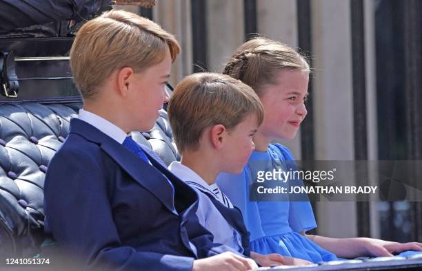 Britain's Prince George of Cambridge , Britain's Prince Louis of Cambridge and Britain's Princess Charlotte of Cambridge leave Buckingham Palace, on...