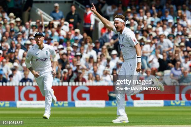 England's Stuart Broad celebrates after the dismissal of New Zealand's Devon Conway on the first day of the first cricket Test match between England...