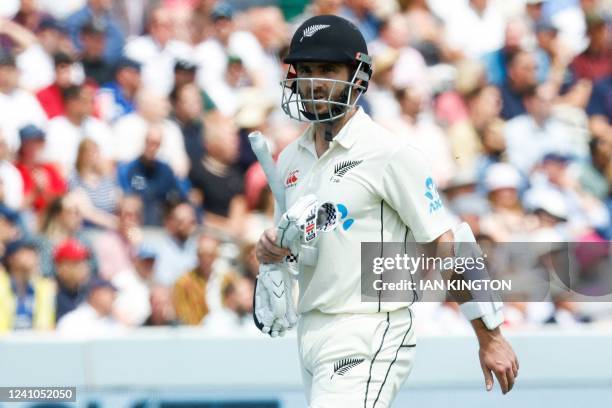 New Zealand's Kane Williamson walks back to the pavilion after his dismissal on the first day of the first cricket Test match between England and New...