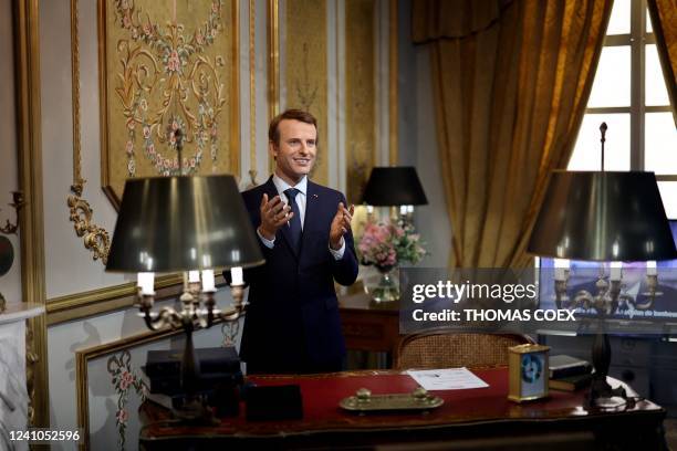 Wax statue of French President Emmanuel Macron is seen at the Musee Grevin in Paris on June 2, 2022.