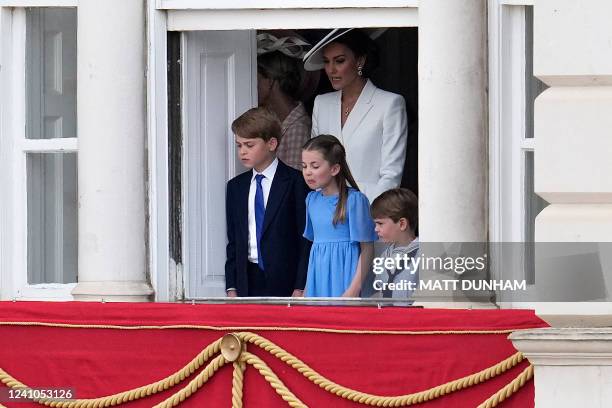Britain's Catherine, Duchess of Cambridge stands with her children Britain's Prince George of Cambridge, Britain's Princess Charlotte of Cambridge...