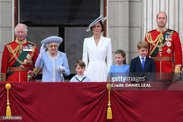 Britain's Queen Elizabeth II stands with from left, Britain's Prince Charles, Prince of Wales, Britain's Prince Louis of Cambridge, Britain's...
