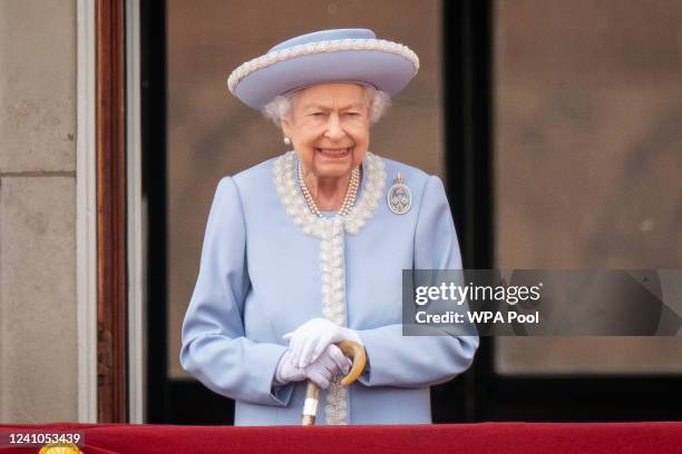 Queen Elizabeth II watches from the balcony at Buckingham Palace for the Trooping the Colour ceremony parade on June 2, 2022 in London, England....