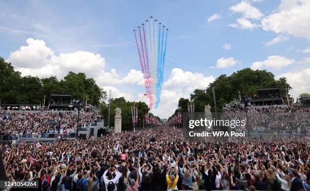 The red arrows over the crowd as they fill The Mall on the first day of celebrations for the Queen's Platinum jubilee on June 2, 2022 in London,...