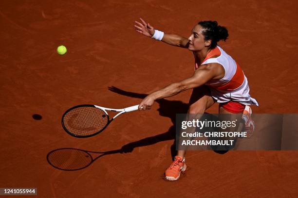 Italy's Martina Trevisan returns the ball to US' Coco Gauff during their women's semi-final singles match on day twelve of the Roland-Garros Open...