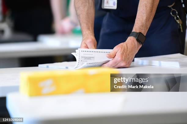 County officials perform a ballot recount on June 2, 2022 in West Chester, Pennsylvania. With less than 1,000 votes separating Republican U.S. Senate...