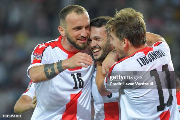 Nika Kvekveskiri, Valeri Qazaishvili and Saba Lobzhanidze of Georgia celebrate goal during the UEFA Nations League League C Group 4 match between...