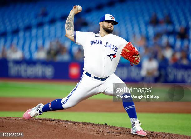 Alex Manoah of the Toronto Blue Jays delivers a pitch in the second inning during a MLB game against the Chicago White Sox at Rogers Centre on June...