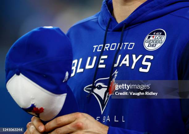 The Toronto Blue Jays celebrate Lou Gehrig Day during a MLB game against the Chicago White Sox at Rogers Centre on June 02, 2022 in Toronto, Ontario,...