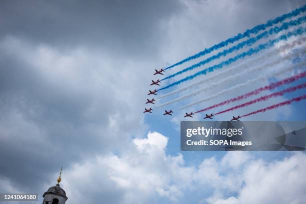 Red Arrows perform a flypast during the Queen Elizabeth II Platinum Jubilee 2022. The event marks Queen Elizabeth's 70th anniversary of her accession...