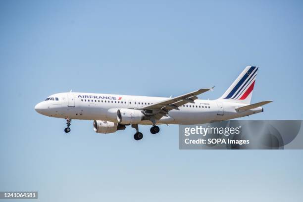 Air France airplane is seen landing at El Prat Airport.
